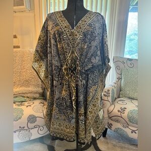 Loose fitting top with draw string waist line